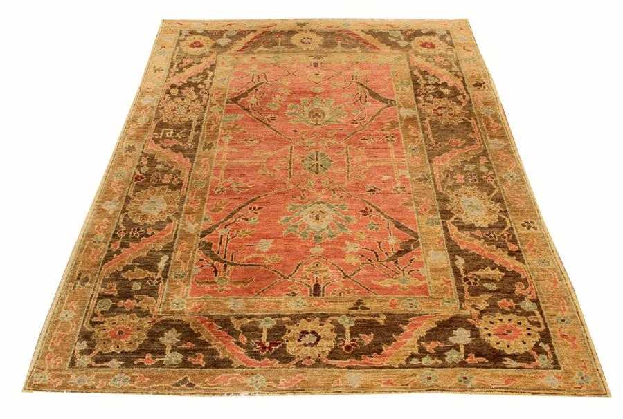 TIBET, TUFKENIAN WOOL RUG, W 4' 6", L 6' 6": TIBET, TUFKENIAN WOOL RUG, W 4' 6", L 6' 6" Rose field with tan border. Knotted by hand, all wool. Deep pile. See label. Made in Armenia, Tibetan wool.