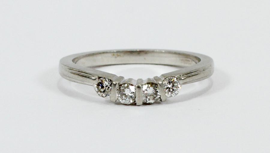 LADY'S DIAMOND & PLATINUM WEDDING BAND: LADY'S DIAMOND & PLATINUM WEDDING BAND, SIZE 5.25 T. W. 3.5 GR. Set with 4 full cut diamonds 0.22 carats. Clarity VS-1 to SI-1, color G + H, finish is good.