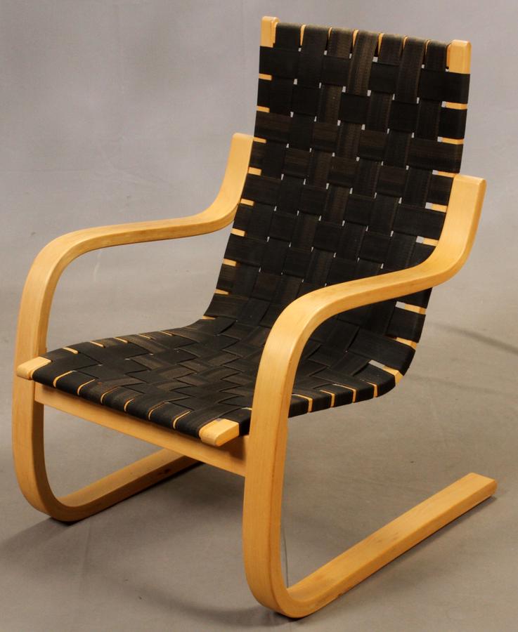 IN THE STYLE OF ALVAR AALTO LOUNGE CHAIR: IN THE STYLE OF ALVAR AALTO (FINLAND), MID-CENTURY MODERN, BIRCH WOOD, LOUNGE CHAIR, C1980, H 34", W 24", D 29" Mid-century modern cantilevered, bent birchwood armchair in the style of Alvar Aalto (Fi