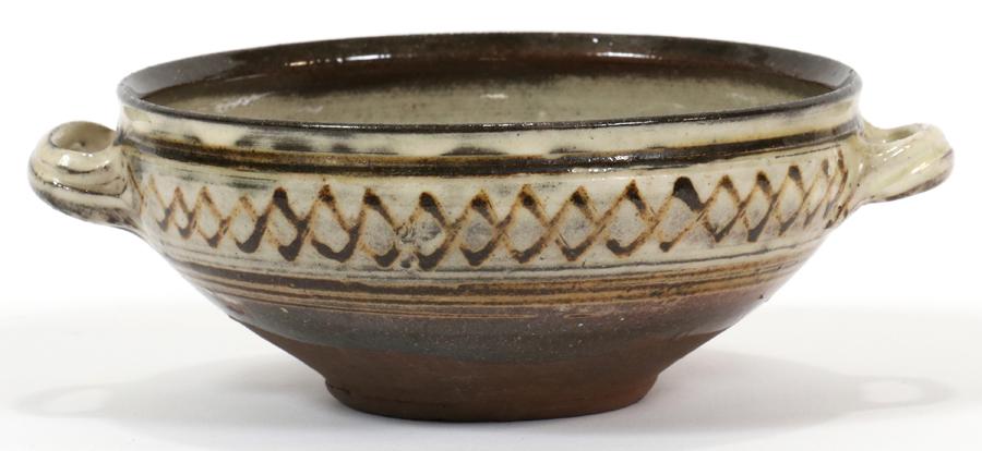GUTTE ERIKSEN POTTERY BOWL, H 2.25", L 7": GUTTE ERIKSEN (DANISH 1918-2008) POTTERY BOWL, H 2.25", L 7" Brown and tan in color with a geometric design at the outer rim.