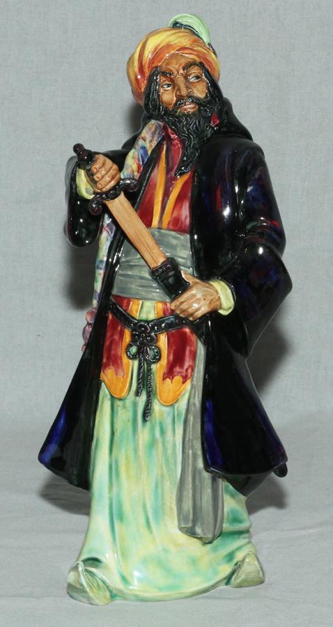 DOULTON & CO. H 11" W 5" 'BLUE BEARD' HN2105: DOULTON & CO. H 11" W 5" 'BLUE BEARD' HN2105 Depicting a robed man in a turban drawing his sword. hand painted.