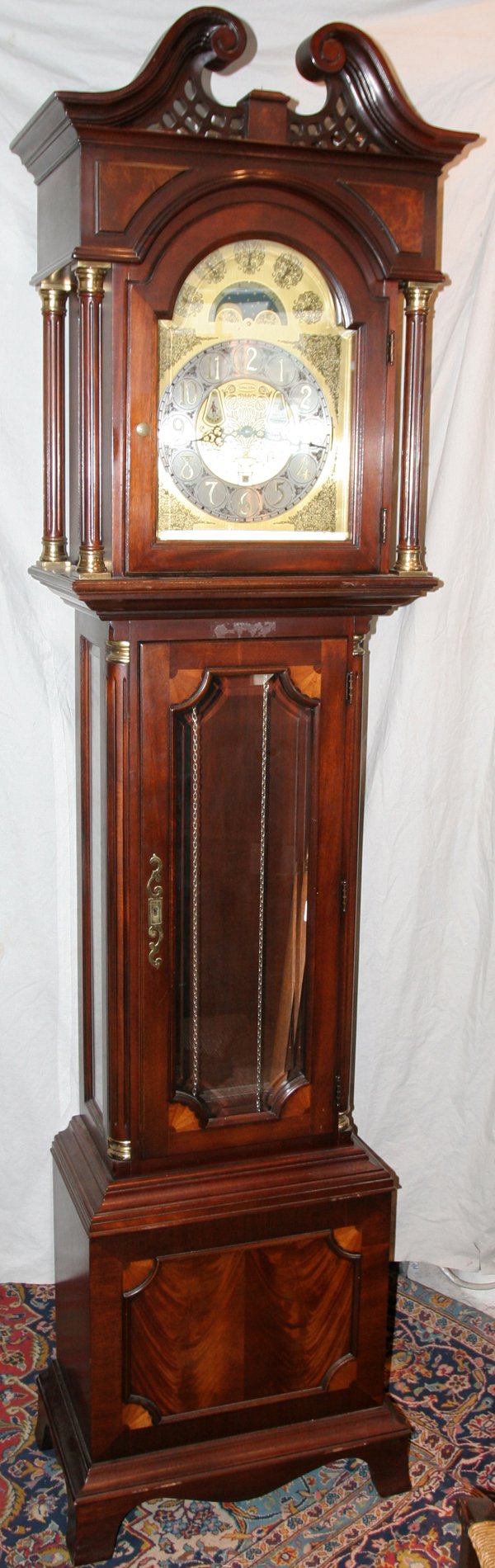 BICENTENNIAL ETHAN ALLEN GRANDFATHER CLOCK: BICENTENNIAL ETHAN ALLEN MAHOGANY GRANDFATHER CLOCK INLAID WITH SATINWOOD C. 1950'S, H 99":Georgian style; bevelled glass tablet and side panels; moon phase dial; pierced swan neck crest; raised on br