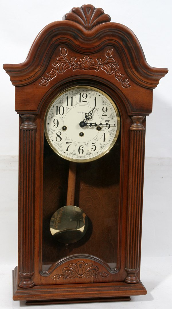 082079 HOWARD MILLER 613104 WALNUT WALL CLOCK H 28"