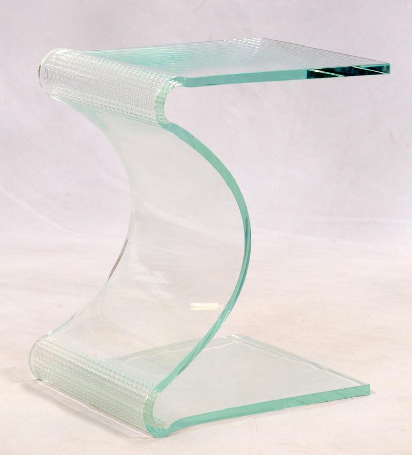 LAUREL FYFE MODERNIST GLASS BENCH, LATE 20TH C: LAUREL FYFE (AMER 1956-2011), MODERNIST GLASS BENCH, LATE 20TH C, H 18", W 22", D 14" Having ribbon bent glass formed into a bench. Michigan artist.