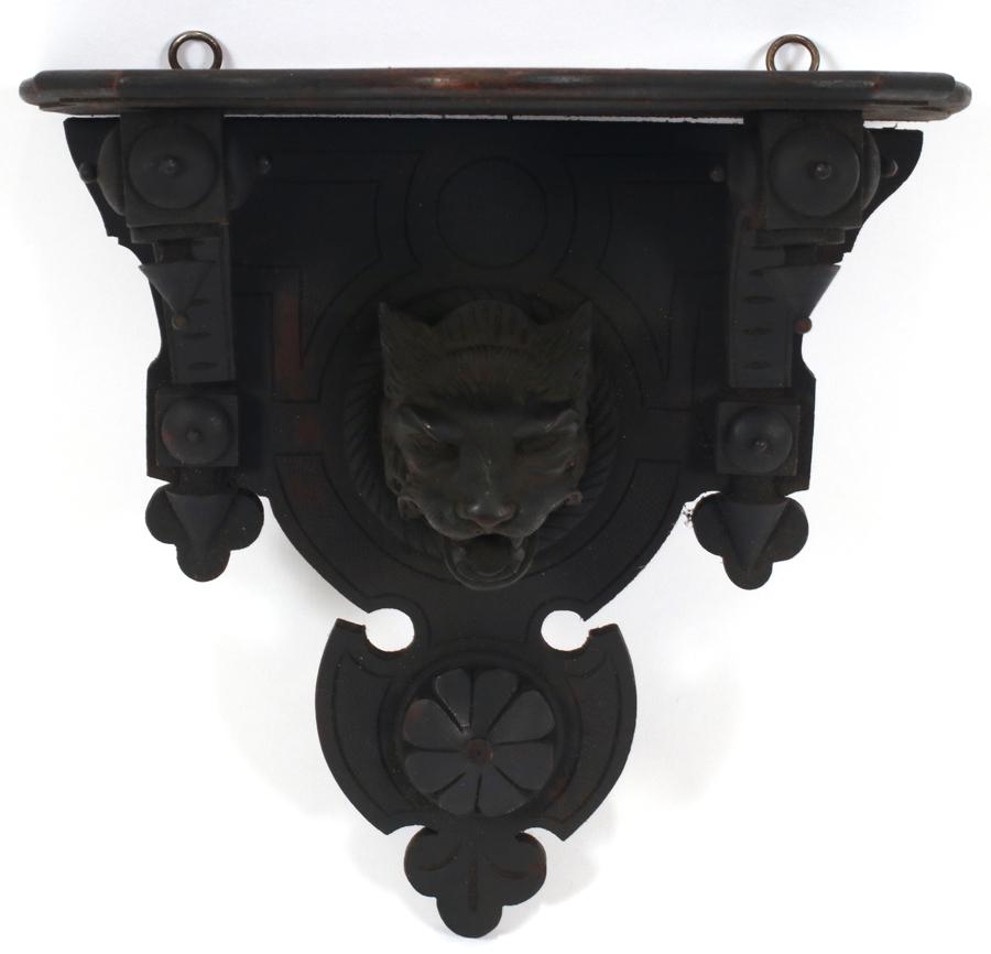 VICTORIAN WOOD CURIO SHELF, CARVED LION HEAD: VICTORIAN WOOD CURIO SHELF, CARVED LION HEAD H 11" Width 11" Walnut. Carved lion head in full relief. Pendants accentuate shelf.