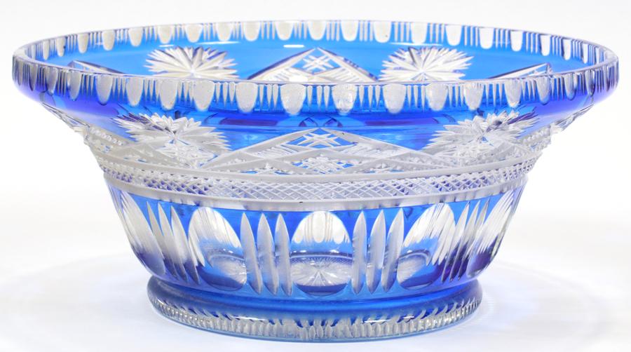 COBALT BLUE OVERLAY HAND CUT CRYSTAL BOWL: COBALT BLUE OVERLAY HAND CUT CRYSTAL BOWL H 5" DIA 11" Hand-cut crystal, star cut base. Probably Czechoslovakia circa 1960.