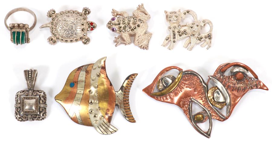 STERLING AND MIXED METAL BROOCHES ETC. 7 PCS.: STERLING AND MIXED METAL BROOCHES ETC. 7 PCS. 925 sterling brooches in form of turtle, cat, frog. Mixed metal hand made abstract brooch has broken clasp. (It is signed by Jane Jenkins 1998 and is made