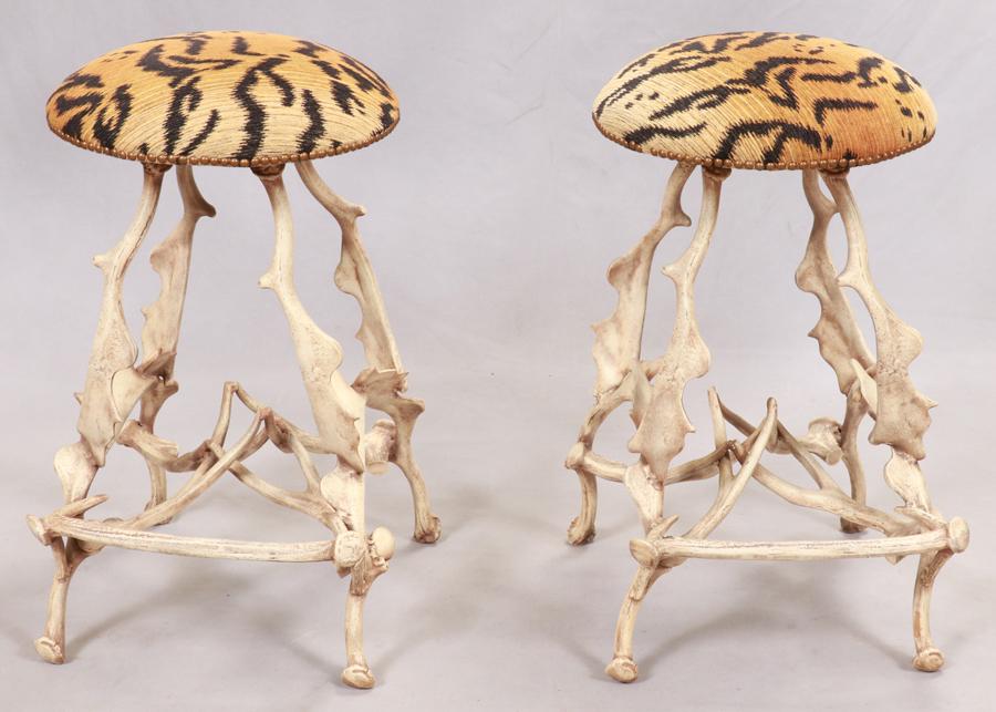 BAR STOOLS, METAL BASES IN STAGHORN MOTIF, TWO: BAR STOOLS, METAL BASES IN STAGHORN MOTIF, TWO H 30" DIA 17" Upholstered seats in animal print motif.