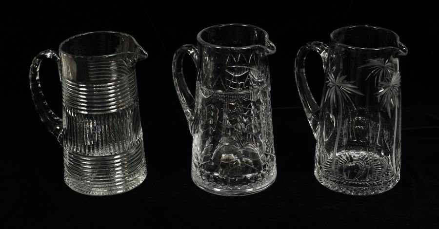 WILLIAM YEOWARD CRYSTAL PITCHERS, 2 PCS + 1 OTHER: WILLIAM YEOWARD (BRITISH) CRYSTAL PITCHERS, 2 PCS + 1 OTHER, H 8.75"A collection of crystal pitchers. Includes two William Yeoward pieces acid stamped on pontil and one unmarked pitcher.