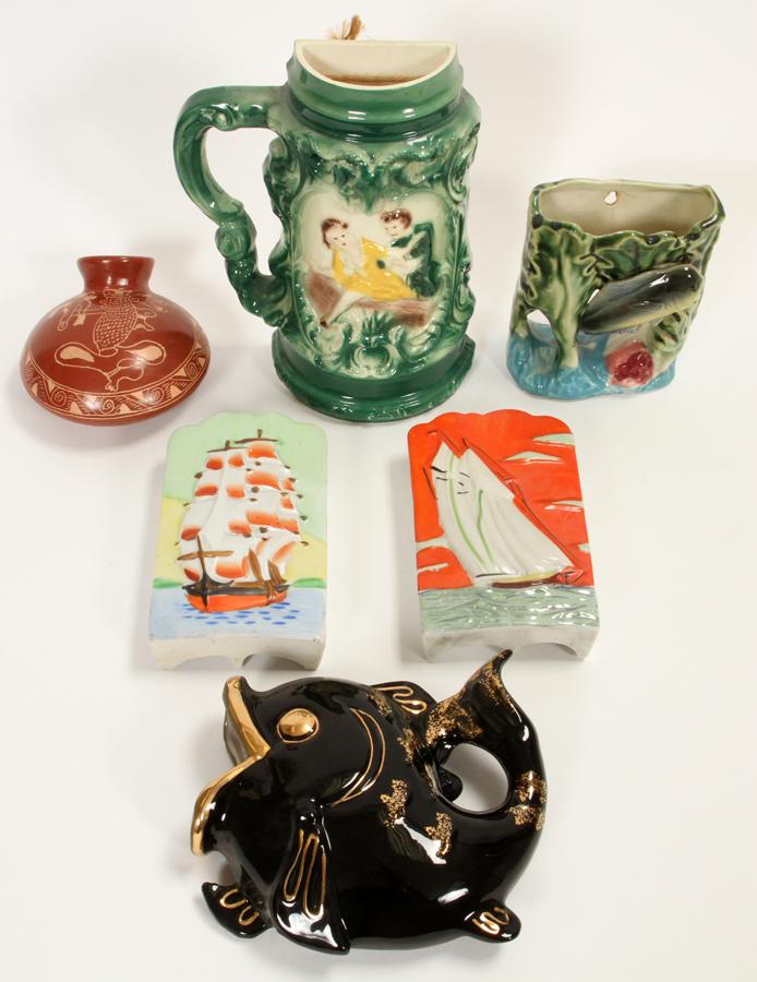 JAPANESE, AMERICAN, PORCELAIN WALL POCKETS: JAPANESE,AMERICAN & MEXICAN, PORCELAIN & POTTERY WALL POCKETS, H 5" - 8.5" Includes, 2 fish motif, and 2 boat motif, Japanese wall pockets. 1 American "Lane and Co." Stien form wall pocket. and 1 pott