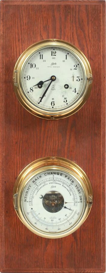 SCHATZ (GERMAN) SHIP'S CLOCK & BAROMETER, 2 PCS: SCHATZ (GERMAN) SHIP'S CLOCK & BAROMETER, 2 PCS, H 24", W 9.5"A German Schatz ship's clock and barometer. Both dials mounted on a beveled oak panel.