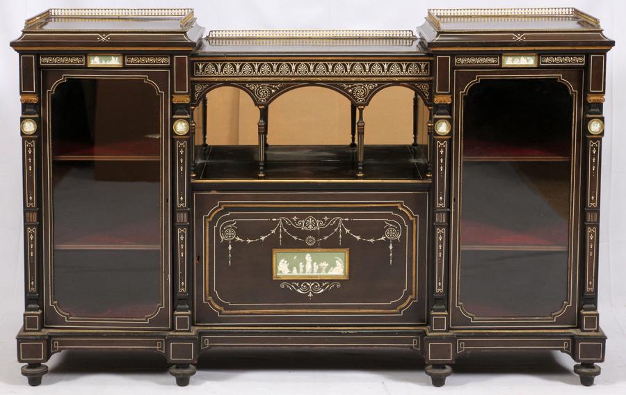 NEOCLASSICAL INFLUENCE EBONIZED CURIO CABINET: NEOCLASSICAL INFLUENCE EBONIZED CURIO CABINET CREDENZA WITH POTTERY PLAQUES, BRONZE ORMULU INLAID MOTHER OF PEARL (1) H 45", W 70"'Having curio display cabinets at each end. Glass framed doors with mo