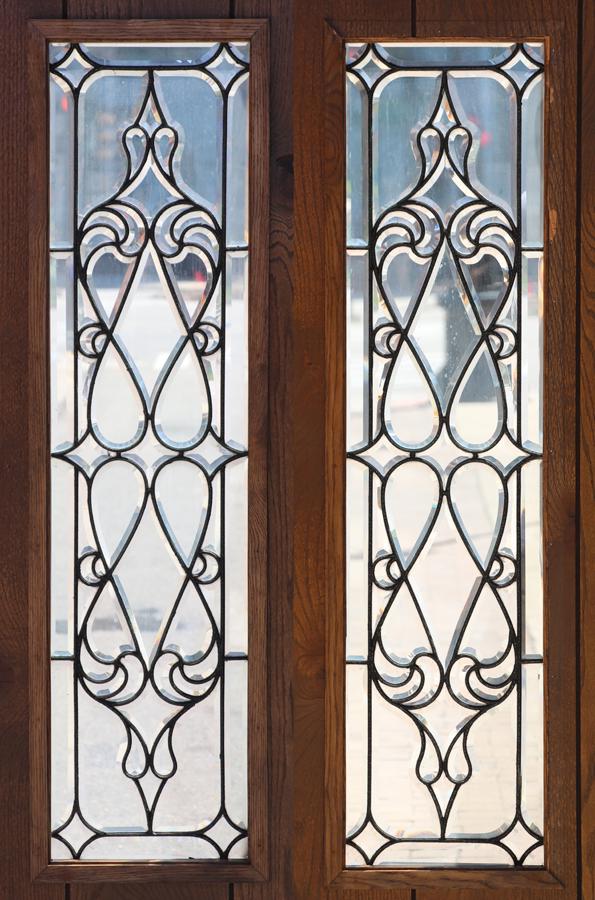 LEADED GLASS WINDOW PANES, PAIR, H 3' 8", L 1': LEADED GLASS WINDOW PANES, PAIR, H 3' 8", L 1' A pair of leaded glass window panes. Frames measure H 8' 2" x L 3' 4".