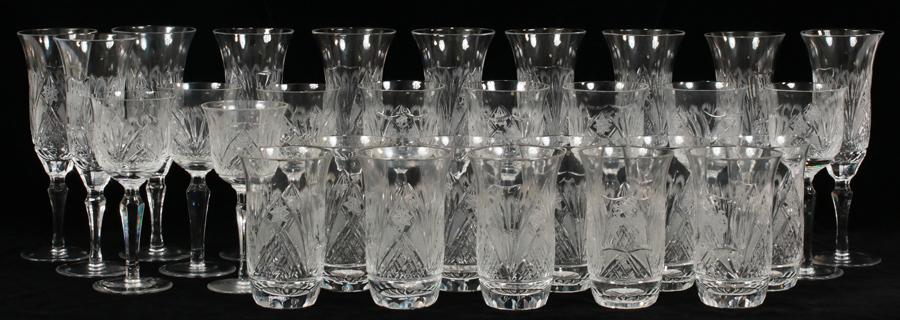 CUT CRYSTAL WINES, FLUTES & WATER GLASSES, 29 PCS: CUT CRYSTAL WINES, FLUTES & WATER GLASSES, 29 PCS, H 5"-8.5"A collection of twenty-nine cut crystal stemware. Includes ten flutes, ten water glasses and nine sherry glasses. Each having an etched cres