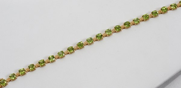 14KT YELLOW GOLD & PERIDOT BRACELET