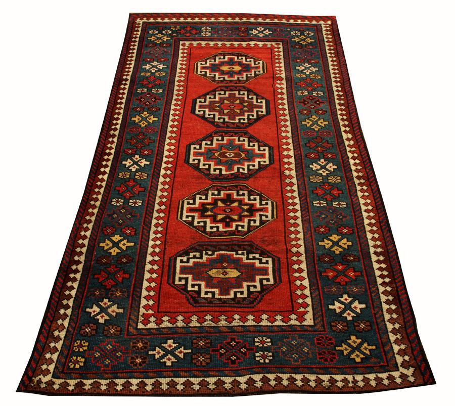 RUSSIAN, ANTIQUE, HAND WOVEN WOOL RUG, 1900: RUSSIAN, ANTIQUE, HAND WOVEN WOOL RUG, 1900, W 3' 6", L 6' Geometric Caucasian design. Strong colors.