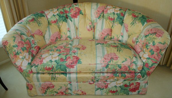 BAKER FURNITURE CO. UPHOLSTERED SETTEES, PAIR: BAKER FURNITURE CO. UPHOLSTERED SETTEES, PAIR, L 67":upholstery design consists of pink and white roses with green stems on yellow ground; From the estate of Jacqueline Shaw, Bloomfield Hills, Mi.