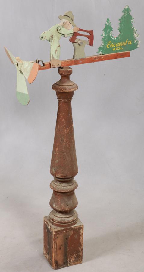FOLK ART PAINTED WOOD WHIRLY-GIG, ESCANABA, MI: FOLK ART PAINTED WOOD WHIRLY-GIG, H 48", W 24", ESCANABA, MI A Folk Art hand-carved and painted wood whirly-gig from Escanaba, Michigan.