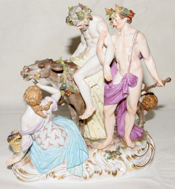 MEISSEN PORCELAIN GROUP 'SILENUS ON A DONKEY': "MEISSEN PORCELAIN FIGURE GROUP, 'SILENUS ON A DONKEY', H 8 1/2"", L 8 1/2"":Modeled by Meyer, a nude old man Silenus Greek God of wine making riding a donkey and a young man with a woman and a cherub