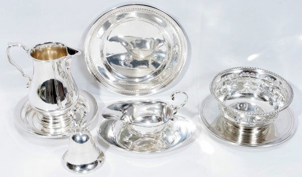 BIRKS, GORHAM, FISHER, ELEDER-HICKOK STERLING: BIRKS, GORHAM, FISHER & ELEDER-HICKOK STERLING SILVER TABLE WARE, EIGHT PIECES:Birks includes 1 sauce boat raised on three feet, number 15/30, L.4 3/4" (2.18 troy oz.), 1 oval tray, #12/31, L.5 1/2" (