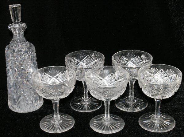 ASSEMBLED CUT GLASS CHAMPAGNES & DECANTER
