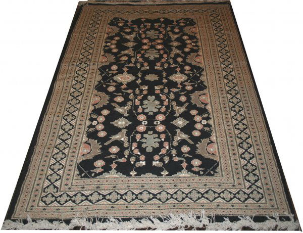 PAKISTANI ORIENTAL RUG, 6' 0" X 4' 0": PAKISTANI ORIENTAL RUG, 6' 0" X 4' 0":Black ground, four borders, floral field.