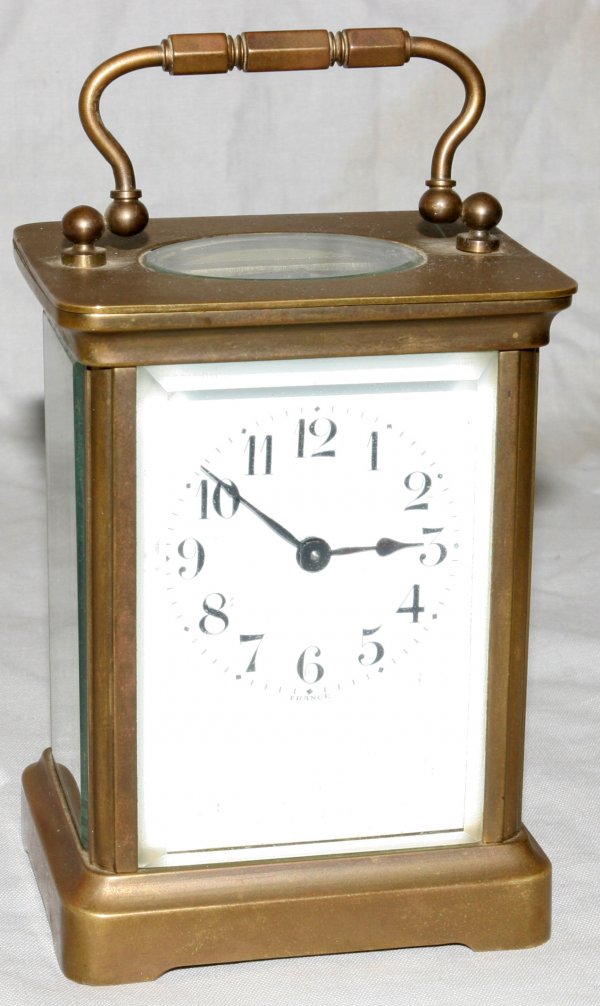 FRENCH BRASS & BEVELED GLASS CARRIAGE CLOCK