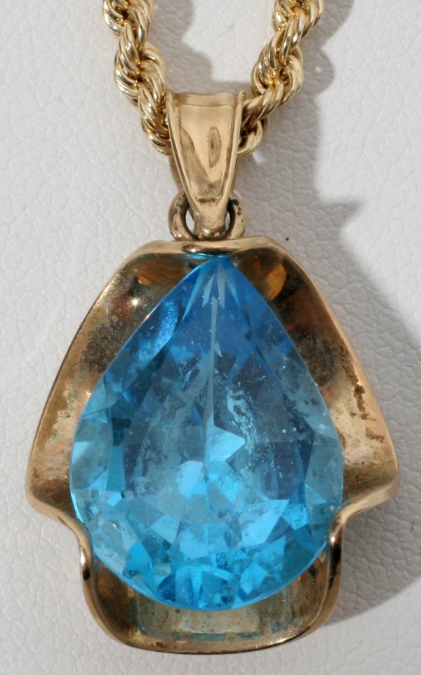 10KT GOLD NECKLACE WITH BLUE TOPAZ DROP