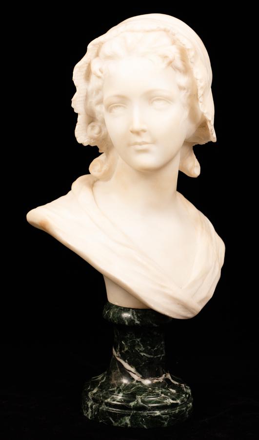 GUSTAVE VAN VAERENBERGH MARBLE BUST, H 15", W 8": GUSTAVE VAN VAERENBERGH (BELGIAN, 1873-27), MARBLE BUST, H 15", W 8"A carved marble bust by Gustave Van Vaerenbergh. Depicting a young woman in a lace bonnet. Artist's signature incised to the backsid