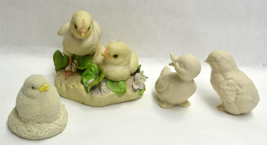 CYBIS, BISQUE PORCELAIN BABY CHICKS, 4 PCS., H 3": CYBIS, BISQUE PORCELAIN BABY CHICKS, 4 PCS., H 3" A Landon porcelain baby duck, 3 1/2" H. x 2 1/2" W. x 2 1/2" D. A Landon porcelain baby chicken, 3" H. x 2" W. x 3" D. and one Cybis porcelain figurin