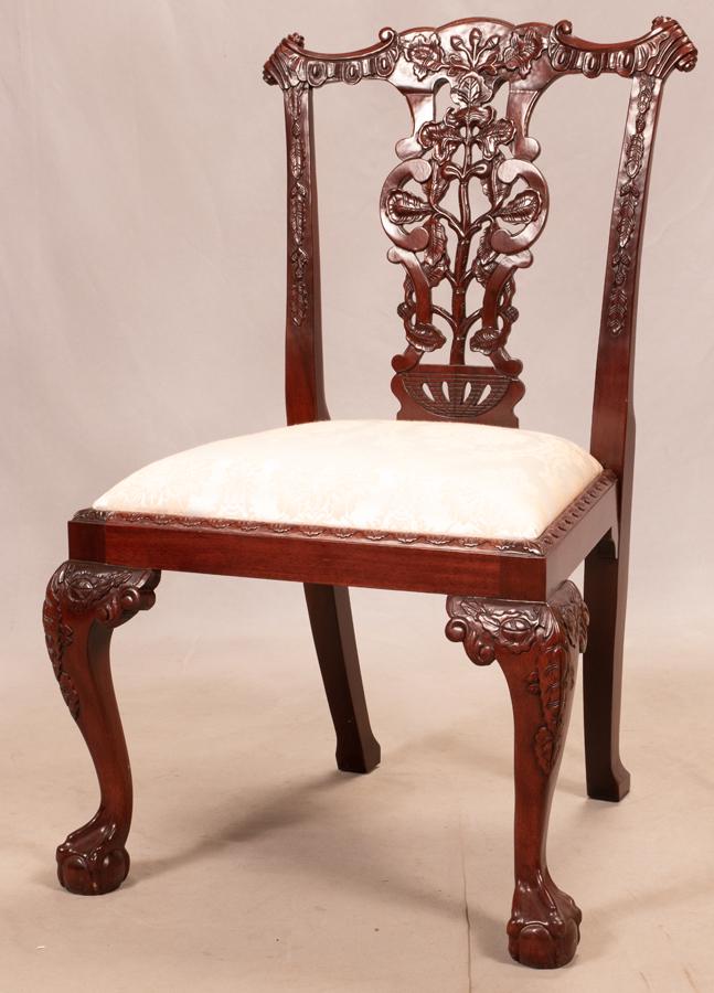 CHIPPENDALE STYLE MAHOGANY CHAIR, H 40", W 24": CHIPPENDALE STYLE MAHOGANY CHAIR, H 40", W 24"A Chippendale style mahogany chair. Features ball and claw form feet and pierced back. Depth 18".