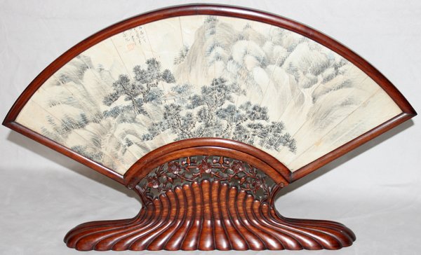 CHINESE PAINTED FAN MOUNTED IN A WOODEN FRAME: CHINESE HAND PAINTED FAN MOUNTED IN A WOODEN FRAME, H 20", W 12 1/2":Mountain scene. Signed in the area of the sky in scene; From the Estate of Robert D. Ellinger, Grand Rapids, MI.