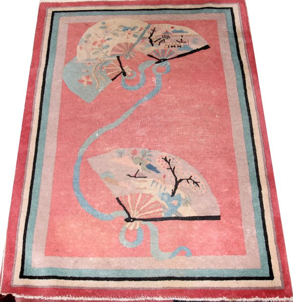 CHINESE ART DECO WOOL CARPET 3'3" X 4'5": "CHINESE ART DECO WOOL CARPET 3'3"" X 4'5"":four pastel colored borders with pink ground with fan shaped patterns. Losses to the fringe ends and much wear. From the Estate of Robert D. Ellinger, Grand