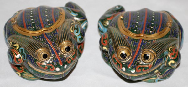 CHINESE CLOISONNÉ FROG CONTAINERS, TWO, H 2": CHINESE CLOISONNÉ FROG CONTAINERS, TWO, H 2", W 5 1/2":having hinged lids on the backs; From the Estate of Robert D. Ellinger, Grand Rapids, MI.
