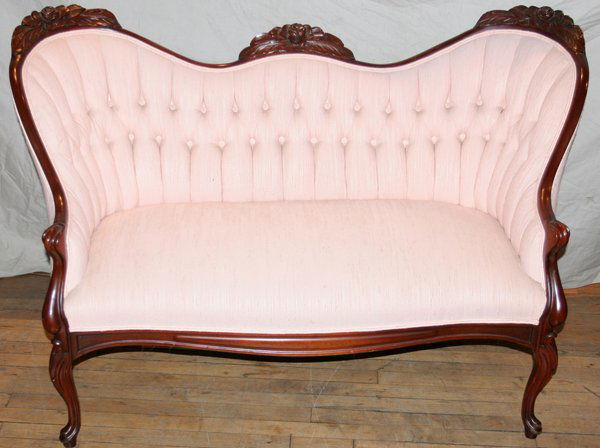 ROCOCO REVIVAL MAHOGANY SETTEES, PAIR, L 51": "ROCOCO REVIVAL MAHOGANY SETTEES, PAIR, L 51"":Each having a undulating chair rail above a tufted back upholstered in pink fabric, raised on modified cabriole legs. Circa 1940, overall H.34 1/2"", L.5