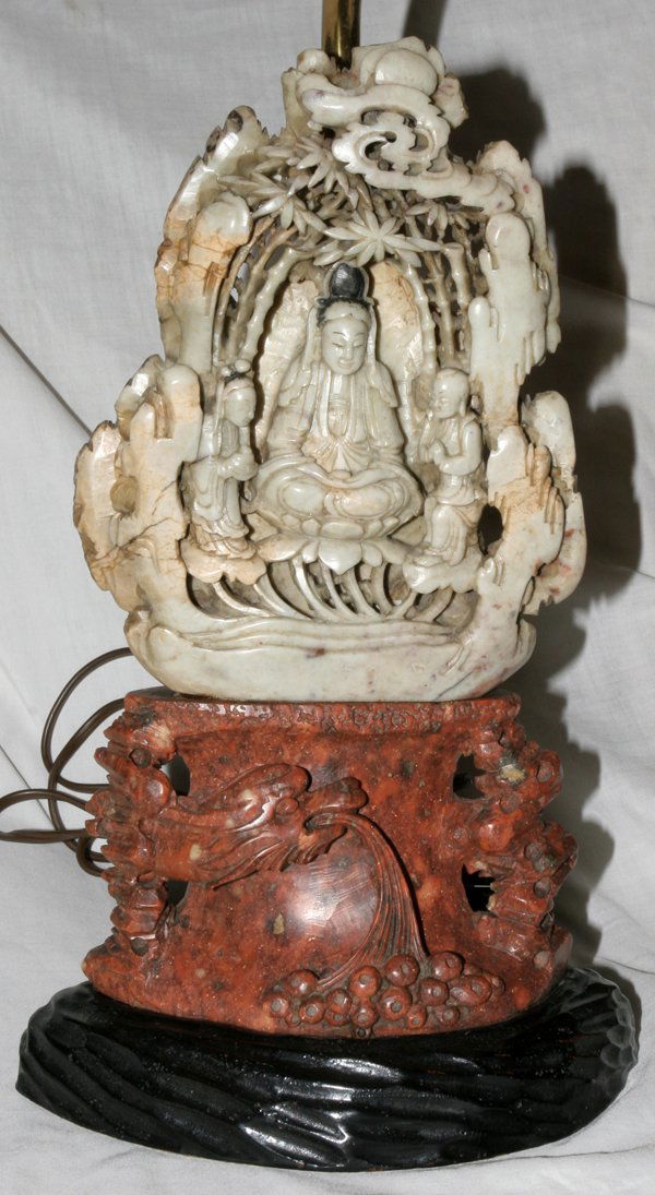 CHINESE HARDSTONE TABLE LAMP, C 1940, H 12": CHINESE HARDSTONE TABLE LAMP, C 1940, H 12":having pale green and rust/red hardstone base depicting figures, Buddha and dragons with a silk shade and black enamel wood base;