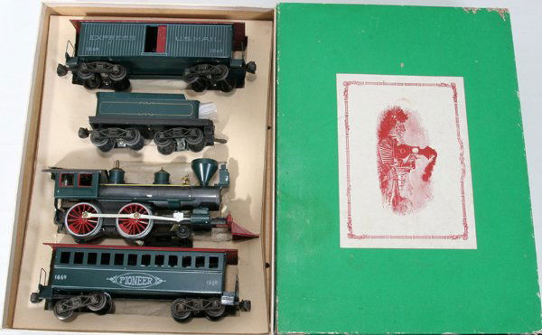 SHAWNEE EXPRESS TOY TRAIN (TPS 4000) THOMAS IND: SHAWNEE EXPRESS, TOY TRAIN (TPS 4000) THOMAS IND. IRON, PEWTER, BAKELITE, TRAIN SET., 4 PCS:Original box minor separation. Train in unused condition Engine L10", U.S mail car #1869 L 9 1/2". Coal tend