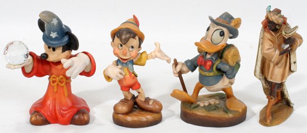 HAND-CARVED WOOD DISNEY FIGURES BY ANRI (3) &: HAND-CARVED WOOD DISNEY FIGURES BY ANRI (3) & ONE OTHER, H 4":Hand carved by Anri. Donald Duck, Pinocchio, Mickey Mouse. Also small hand carved and hand painted figure of king from nativity set by Anr