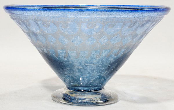 ANNE & GORAN WARFF FOR KOSTA BLUE GLASS BOWL: ANNE & GORAN WARFF FOR KOSTA BLUE GLASS BOWL, C. 1970, H 5", DIA 8 1/2":Having predominately blue ground that is overlaid with a white geometric motif. The underside is signed "Kosta 55772 Warff".