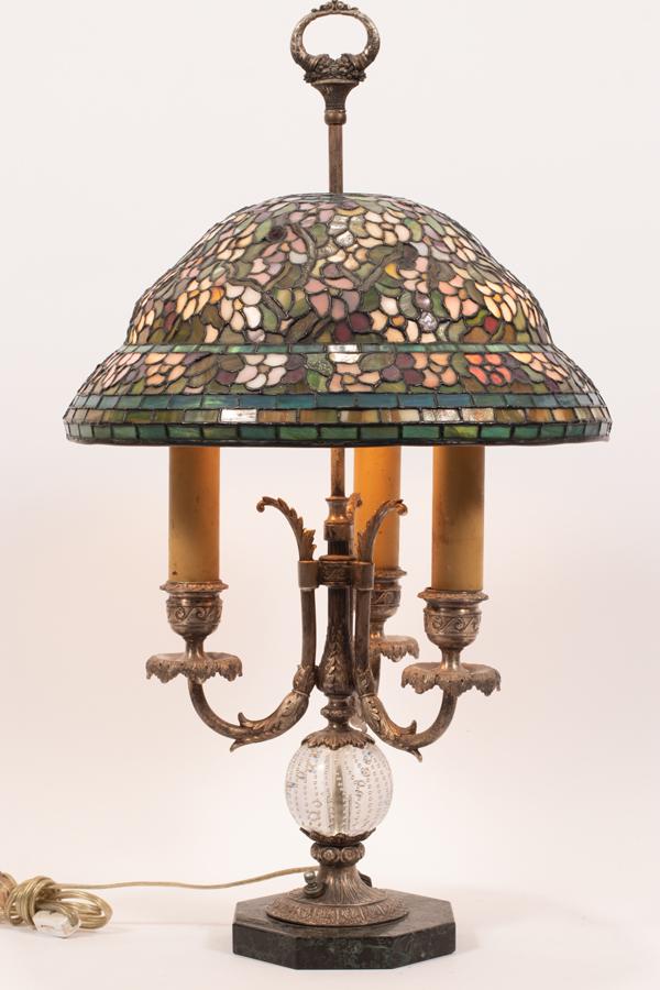 AMERICAN LEADED GLASS SHADE ON A PAIRPOINT BASE: AMERICAN ART GLASS LEADED GLASS SHADE ON A PAIRPOINT BASE, H 26" DIA 14.5" Shade is marked with an added "Duffner Kimberly" tag along inside edge. Shade Dia. 14.5" x H.6". Pairpoint crystal "paperweig