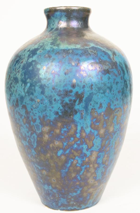 PEWABIC POTTERY VASE H 12" DIA 7": PEWABIC POTTERY VASE H 12" DIA 7" Impressed Pewabic Pottery circular stamp on underside. Iridescent peacock blue glaze boasting turquoise, oxblood and gun metal mottled tones, with a tapering bodice. 