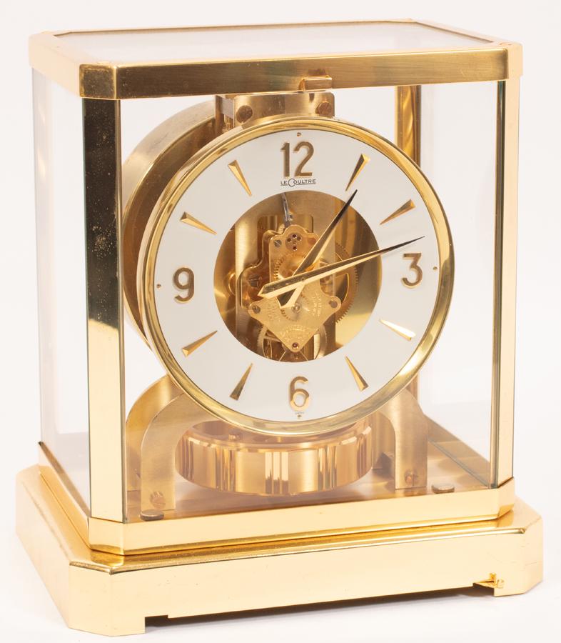 JAEGER - LECOULTRE ATMOSPHERIC CLOCK H 9" W 7.2": JAEGER - LECOULTRE ATMOSPHERIC CLOCK H 9" W 7.2" Perpetual motion clock, no need for winding. Glass on all sides of the brass frame case.