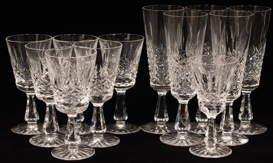 WATERFORD KENMARE CLARET RED WINES (7) AND CHAMPAGNE: WATERFORD KENMARE CLARET RED WINES (7) AND CHAMPAGNE FLUTES (5) H 6", 8" Champagne flutes are 8" high and in good condition. Wine stems are 6". One Claret has been ground down slightly. Hand cut in Ir