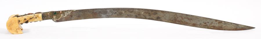 TURKISH SWORD YATAGHAN WITH MULE EAR BONE HILT, CORAL: TURKISH SWORD YATAGHAN WITH MULE EAR BONE HILT, CORAL AND GEMSTONS INLAY, NO SHEATH, 1826 L 32" Two emeralds, six coral gemstones, set in gold and silver inlays on the steel sword blade. Overall size 