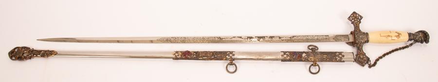 KNIGHTS OF COLUMBUS CEREMONIAL SWORD: KNIGHTS OF COLUMBUS CEREMONIAL SWORD Engraved with mounted knights and their horses. Engraved H.Larry Stanton of Pontiac, Mich. USA. Good to Fair condition. Sword Length 36 1/2" Long. - Silver, Enamel