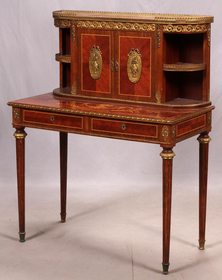 EMPIRE STYLE MAHOGANY AND BRONZE ORMOLU WITH SATIN WOOD: EMPIRE STYLE MAHOGANY AND BRONZE ORMOLU WITH SATIN WOOD INLAY, H 46" W 36" D 18" Two lower drawers, one upper double door cabinet, on fluted legs.
