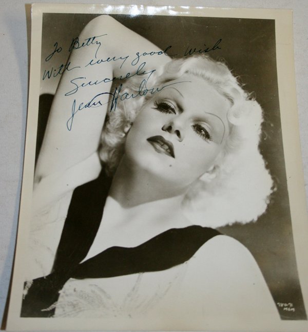 JEAN HARLOW AUTOGRAPHED B/W PHOTO, H 10", W 8": JEAN HARLOW AUTOGRAPHED B/W PHOTO, H 10", W 8":black and white MGM publicity photo inscribed "To Betty With every good wish Sincerely Jean Harlow"; accompanied by a "STAT" authentic certificate of aut