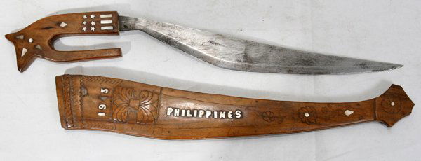 PHILIPPINE MACHETE, C1945 L 22": PHILIPPINE MACHETE, C1945 L 22":mother of pearl inlay in stars and stripes design on carved handle; floral designs in carved sheath.
