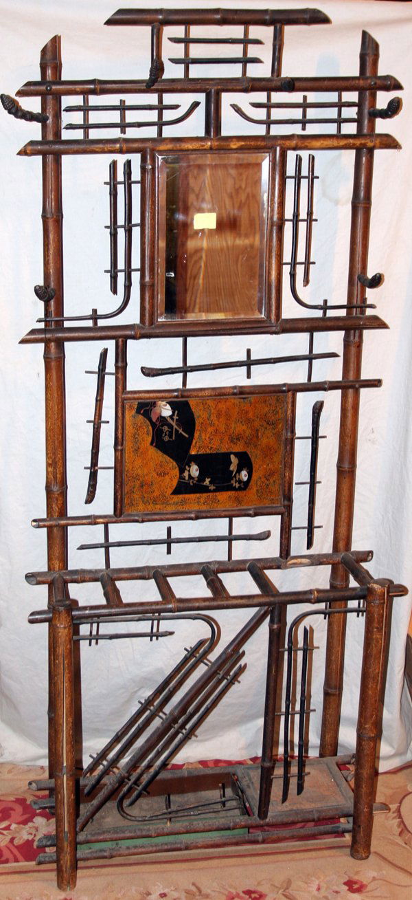 ORIENTAL STYLE BAMBOO HALL TREE/UMBRELLA STAND: ORIENTAL STYLE BAMBOO HALL TREE/UMBRELLA STAND, H 80", L 35", D 13":Back has a Samurai sword painted shield in lacquer ware that is below a beveled mirror (H 14 1/2", L 10" with a 3/4" bevel). Six met