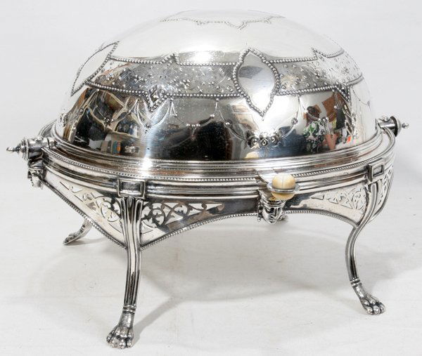 MAPPIN & WEBB REVOLVING SERVER, C. 1870, L 13": MAPPIN & WEBB REVOLVING SERVER, C. 1870, L 13":Electroplate silver entrée/breakfast server with revolving cover opening to a pierced liner; ovoid shape with chased floral and raised bead motifs, an E